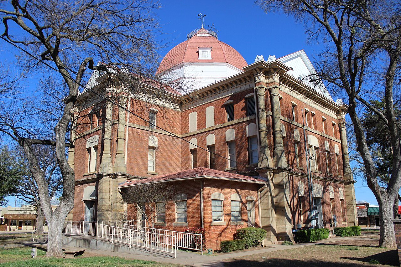 Henrietta, TX street scene near Wichita Falls, where we provide hail damage roof repair